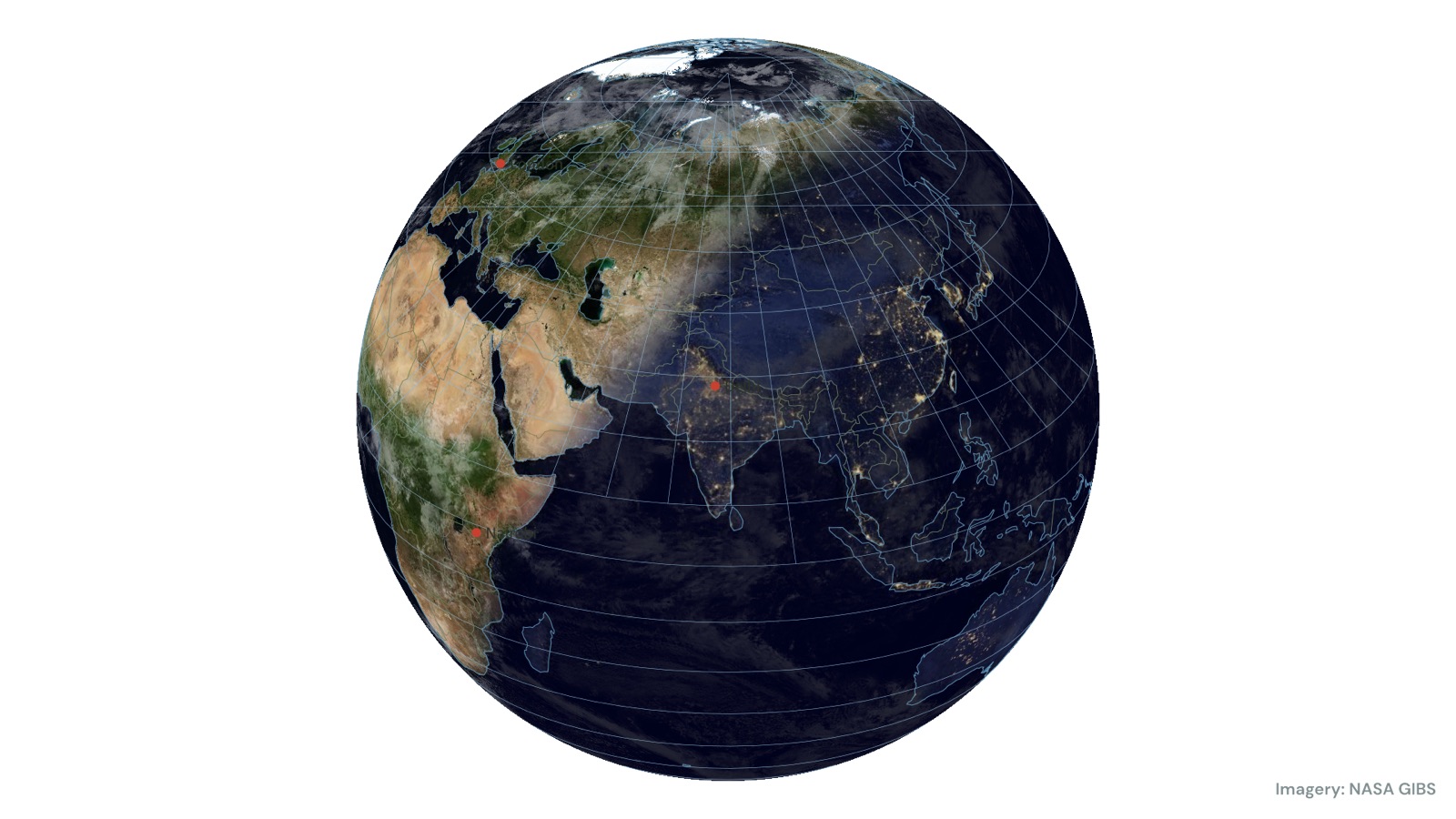 A globe lit by the sun with city lights on the night side